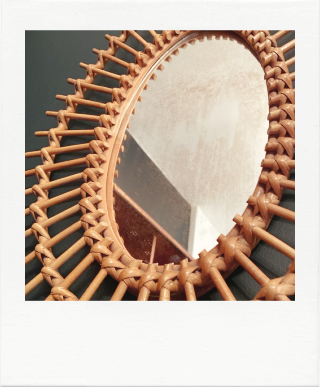 Vintage rattan sun mirror