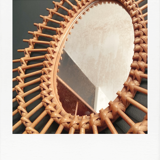 Vintage rattan sun mirror