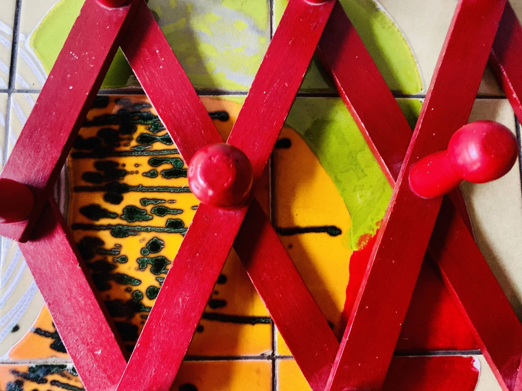 Vintage accordion coat rack in red painted wood