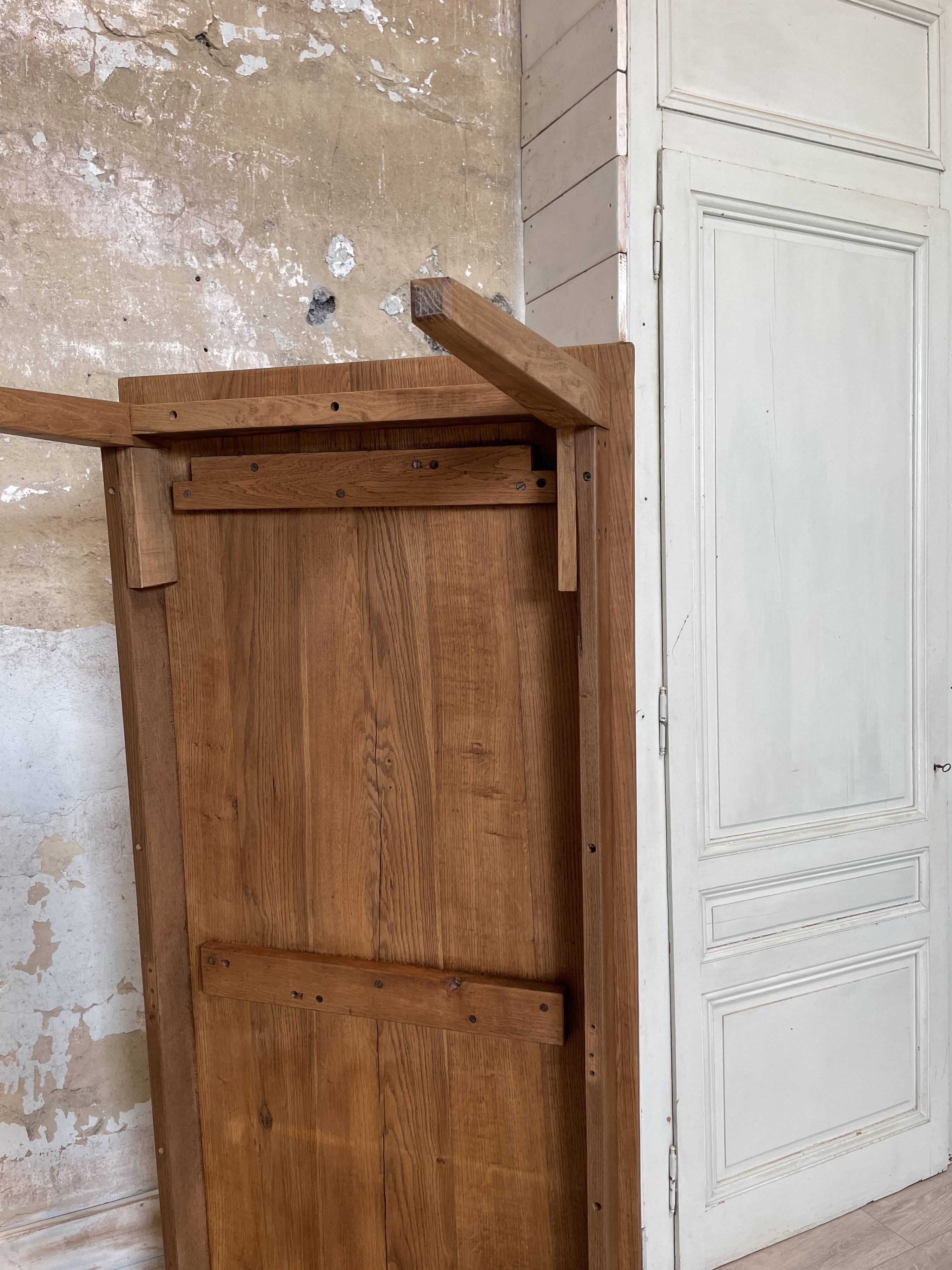 Vintage farm table with spindle legs.