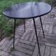 Black metal table compass feet