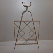 Vintage magazine holder in gold metal