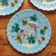 3 assiettes en barbotine bleues décor oiseaux Sarreguemines