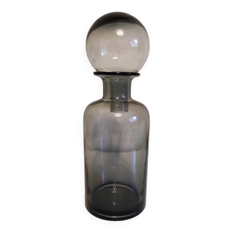 gray glass carafe with stopper