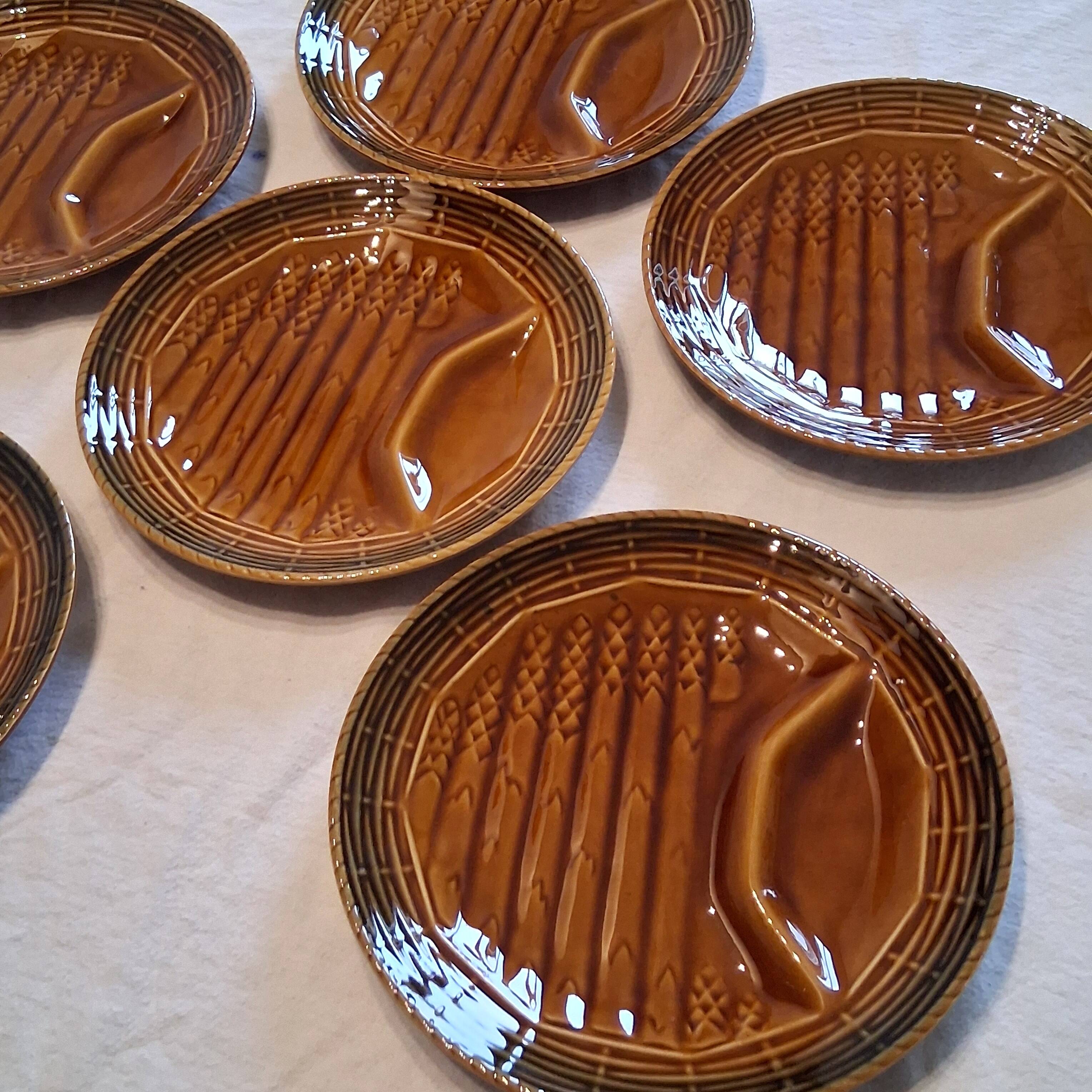 6 asparagus plates stamped "Sarreguemines" on the back in very good condition.