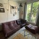 Togo set by Ligne Roset in vintage pink, plum, and burgundy leather.