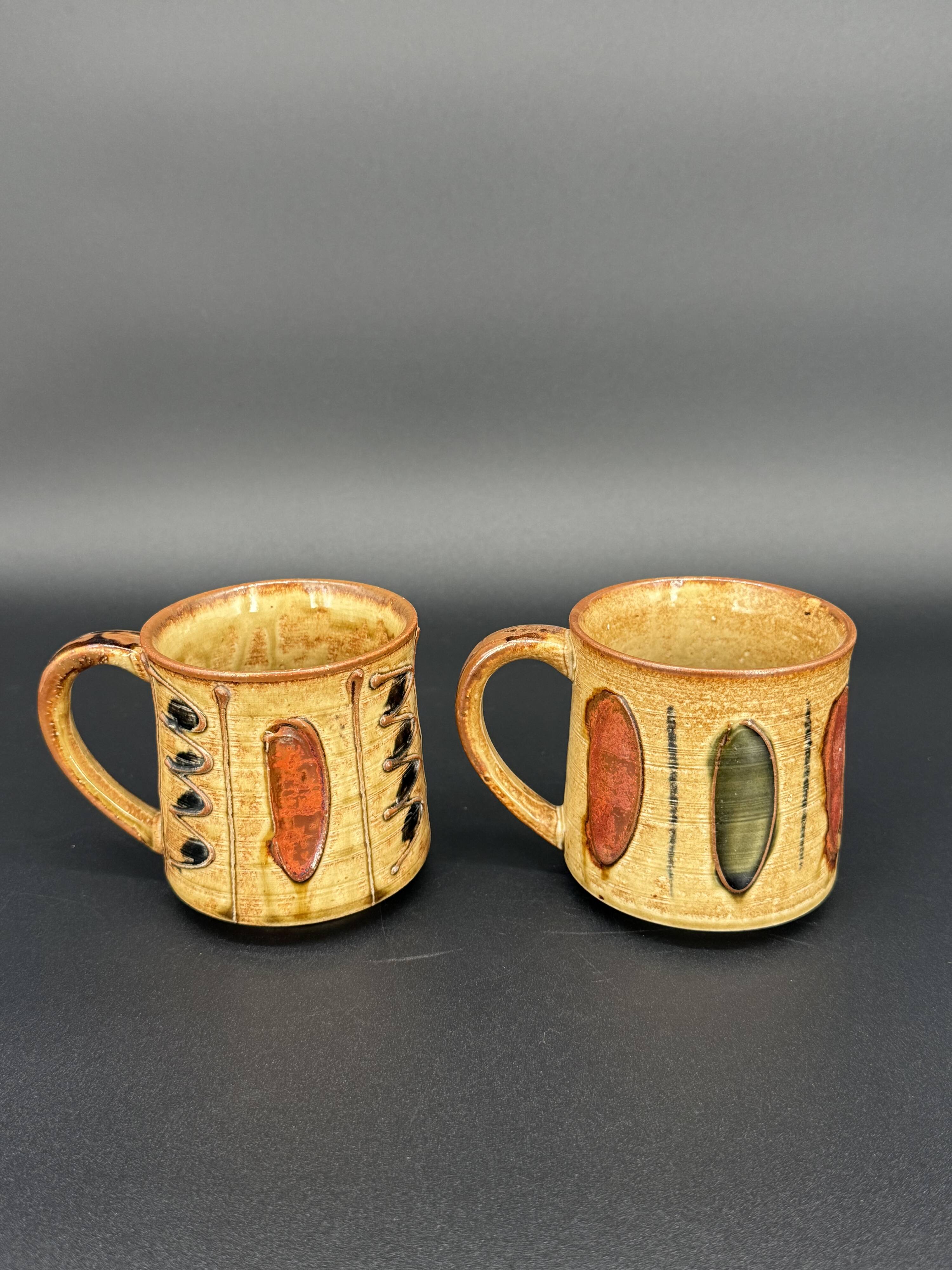 Pair of glazed stoneware mugs — abstract decor from the 70s