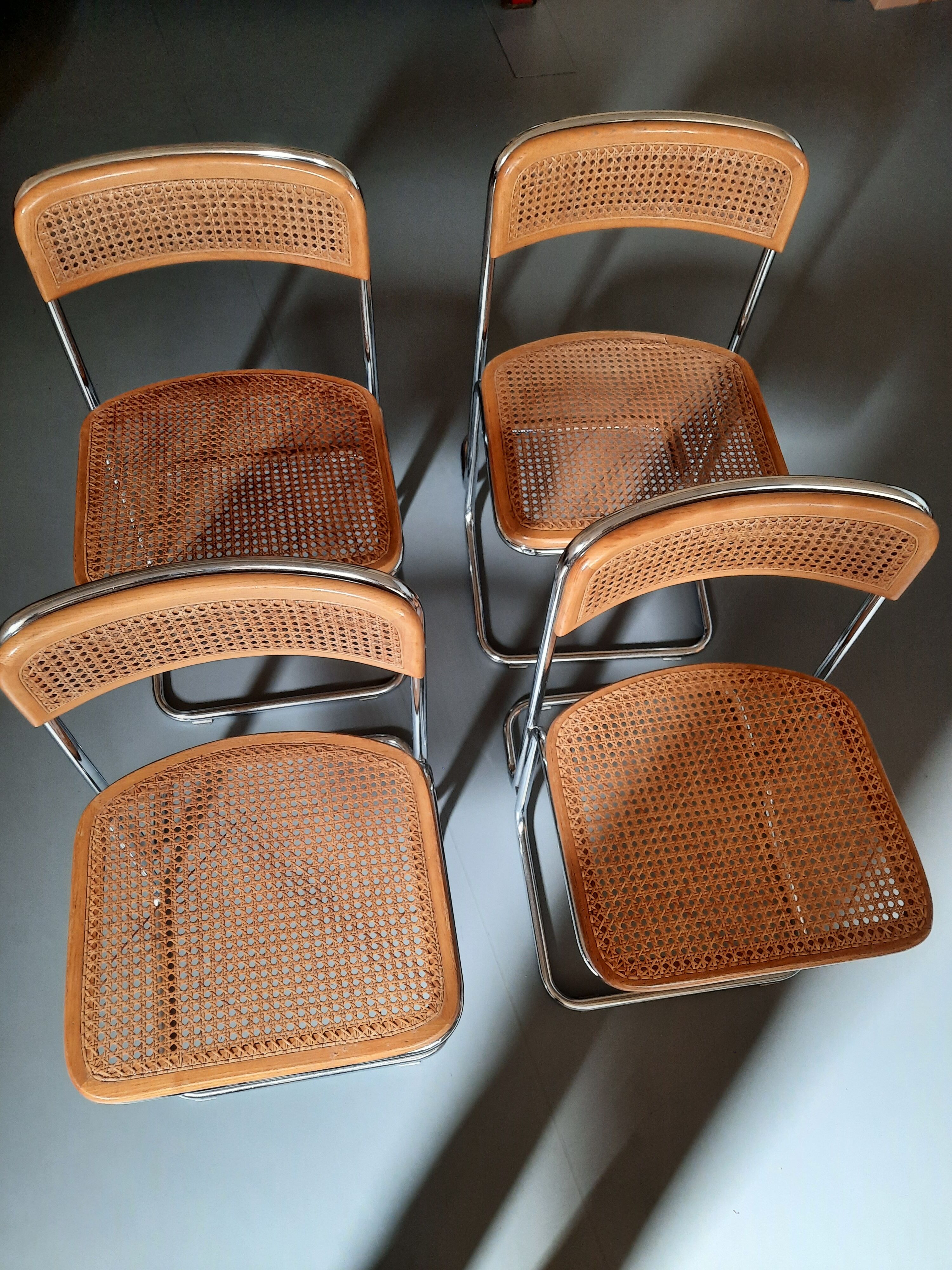 Set of 4 TIVIR chairs in cane and chrome metal.