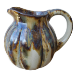 Ceramic pitcher in the shape of a coloquinte melo.