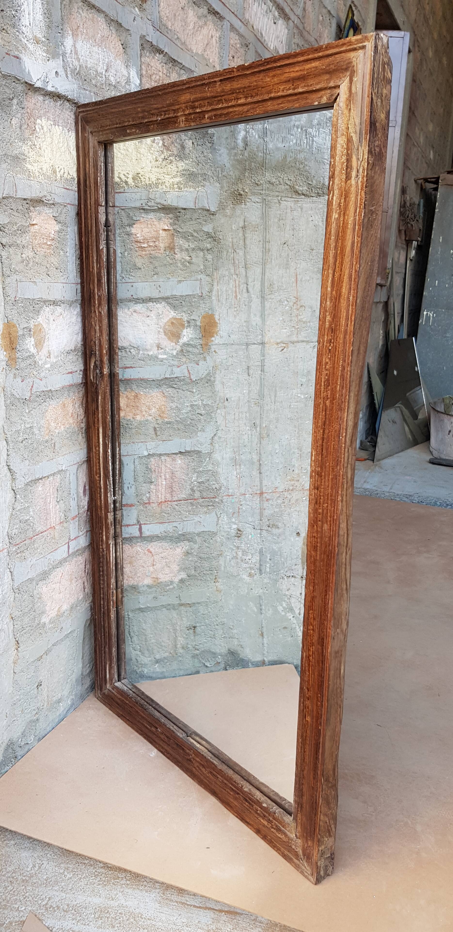 Ancient Burmese teak mirror