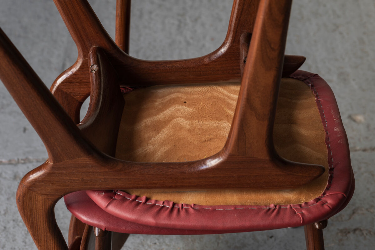 Set of 4 dining chairs in teak and burgundy by Louis van Teeffelen, The Netherlands, 1960’s