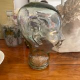 Marotte head to glass hat