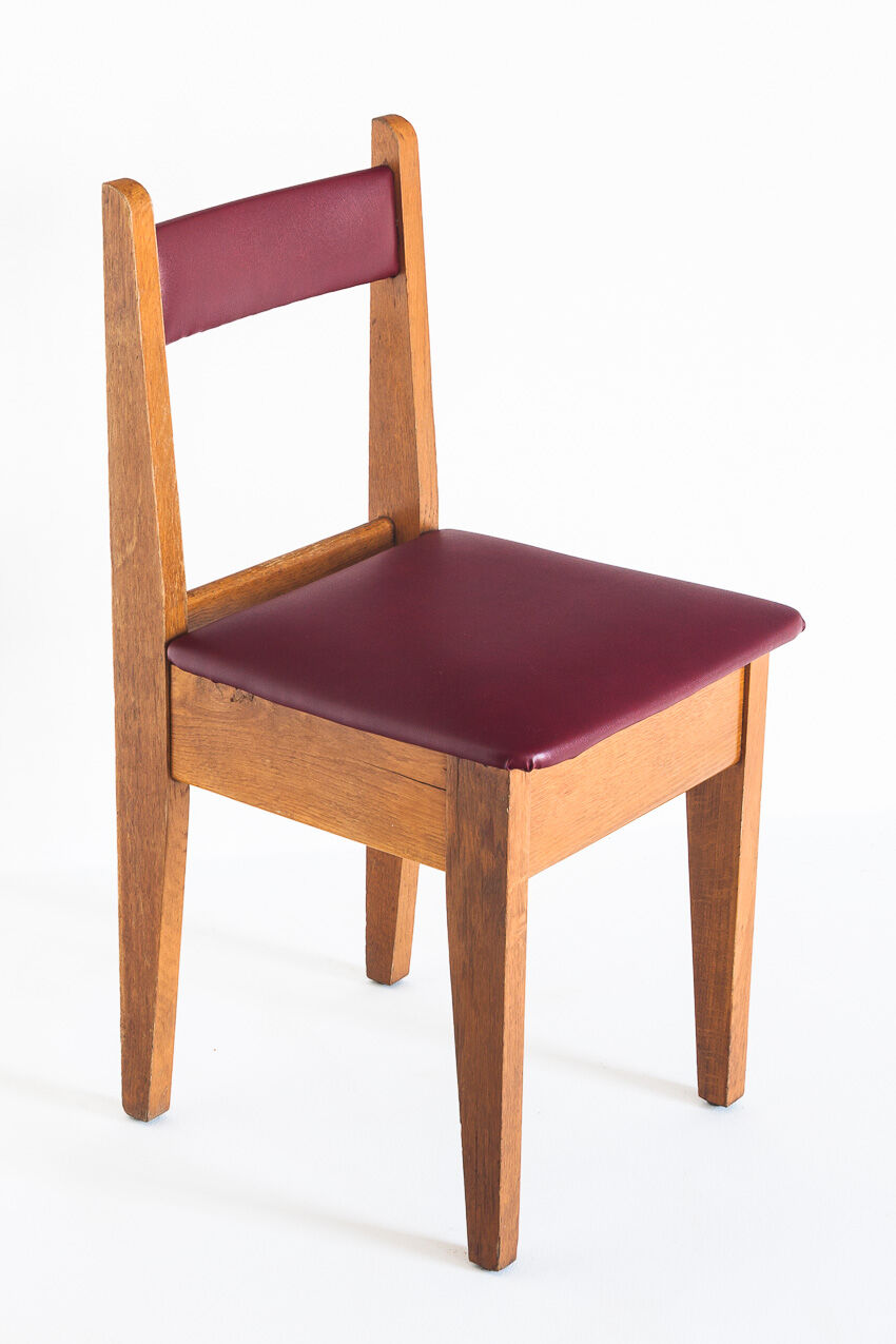 Set of 4 vintage oak wood and Eskai chairs, France 1960.