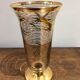 Glass vase with gold bird decoration