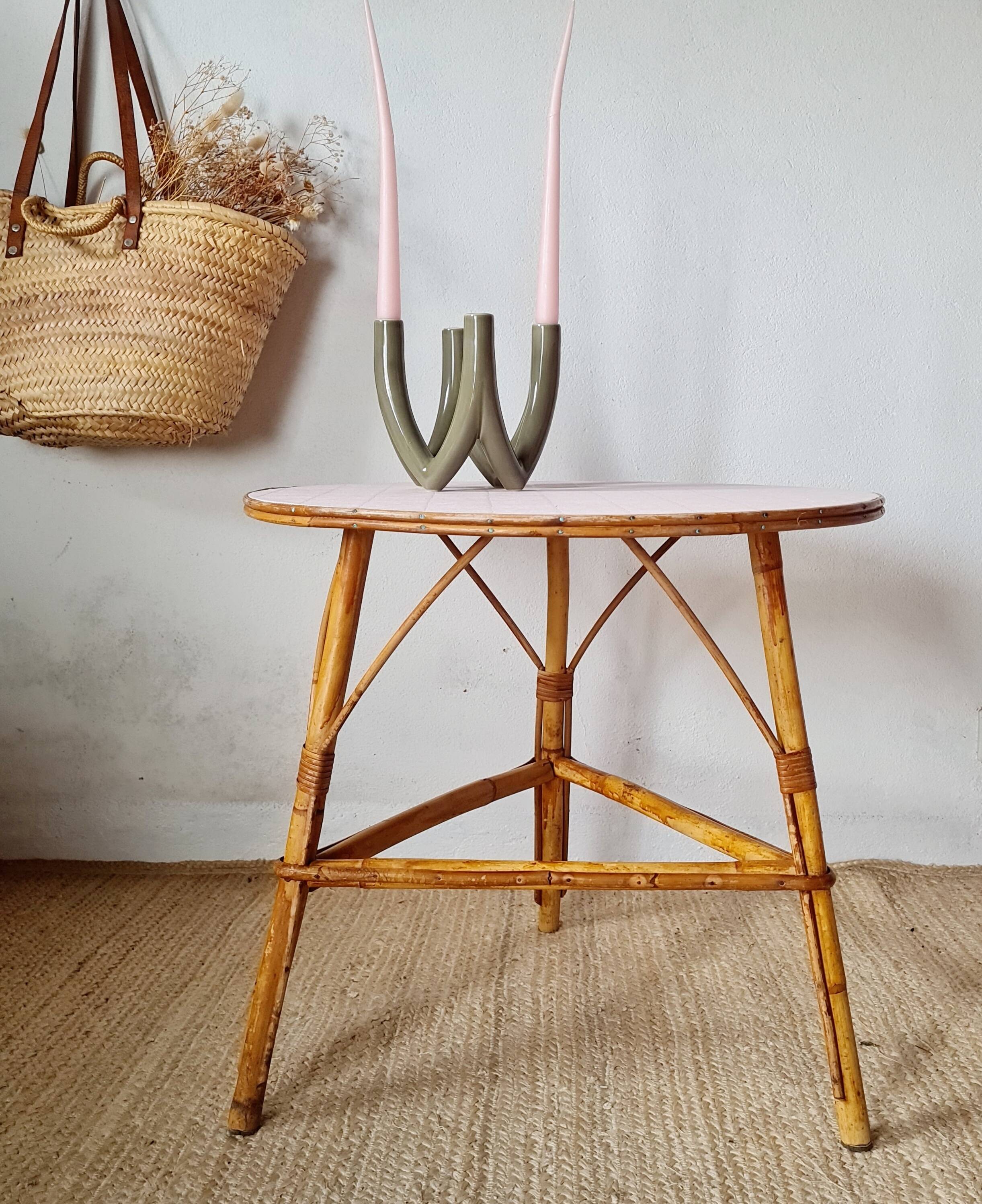Round soft pink rattan table