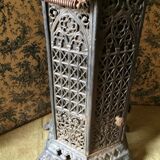 Weathered cast iron heater