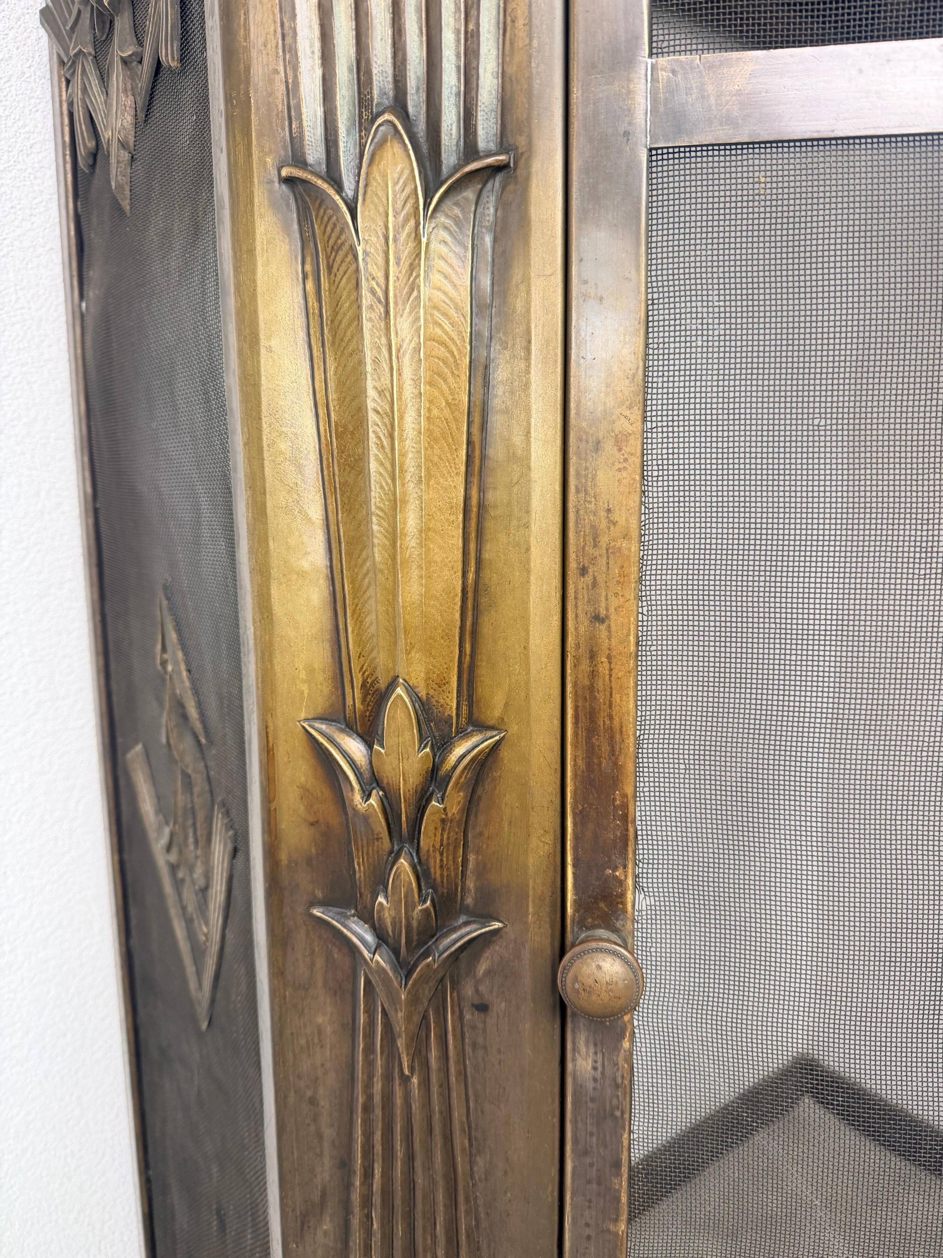 Corner fireplace screen in brass attributed to Dagobert Peche