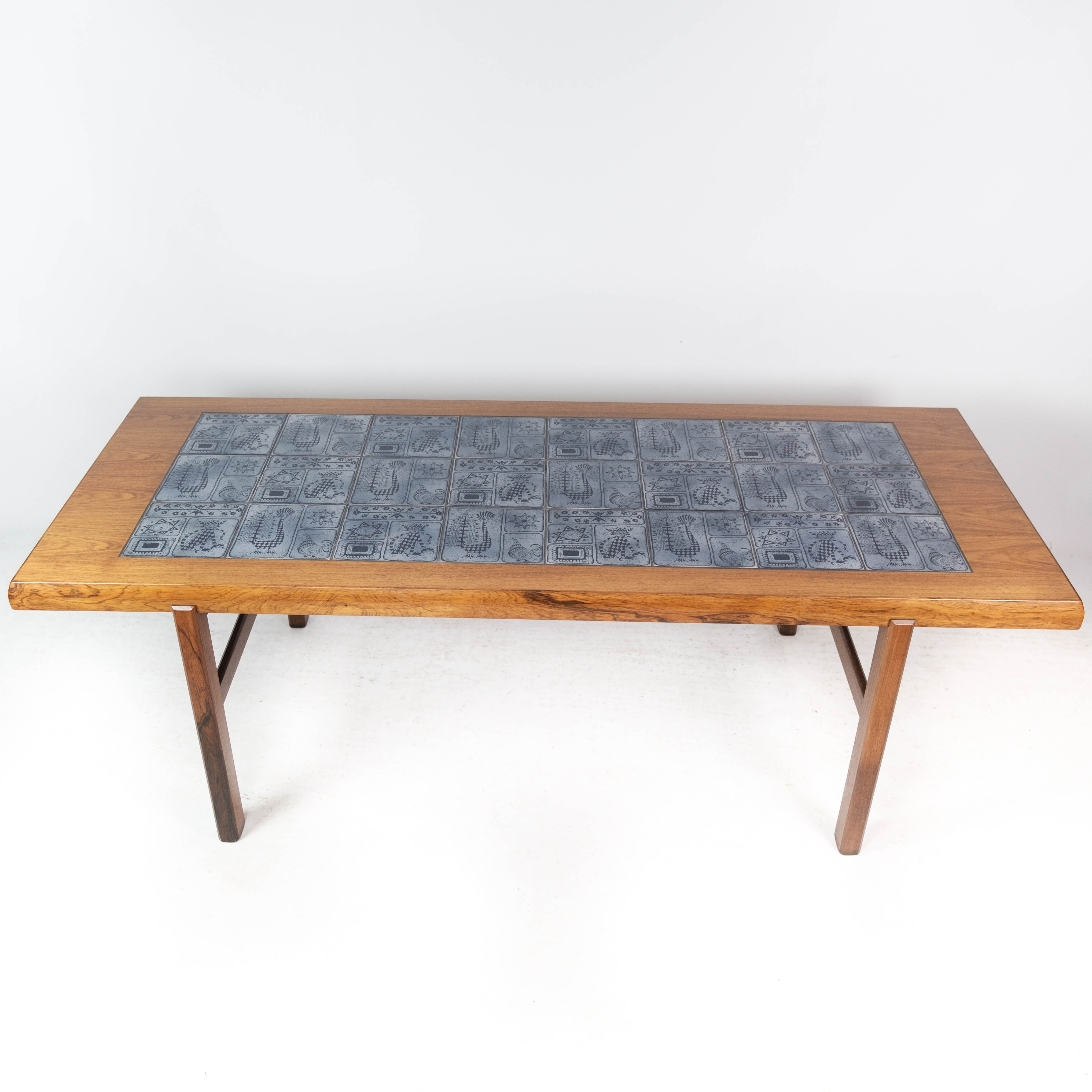 Coffee table in rosewood with blue tiles of Danish design by Arrebo Furniture, 1960s