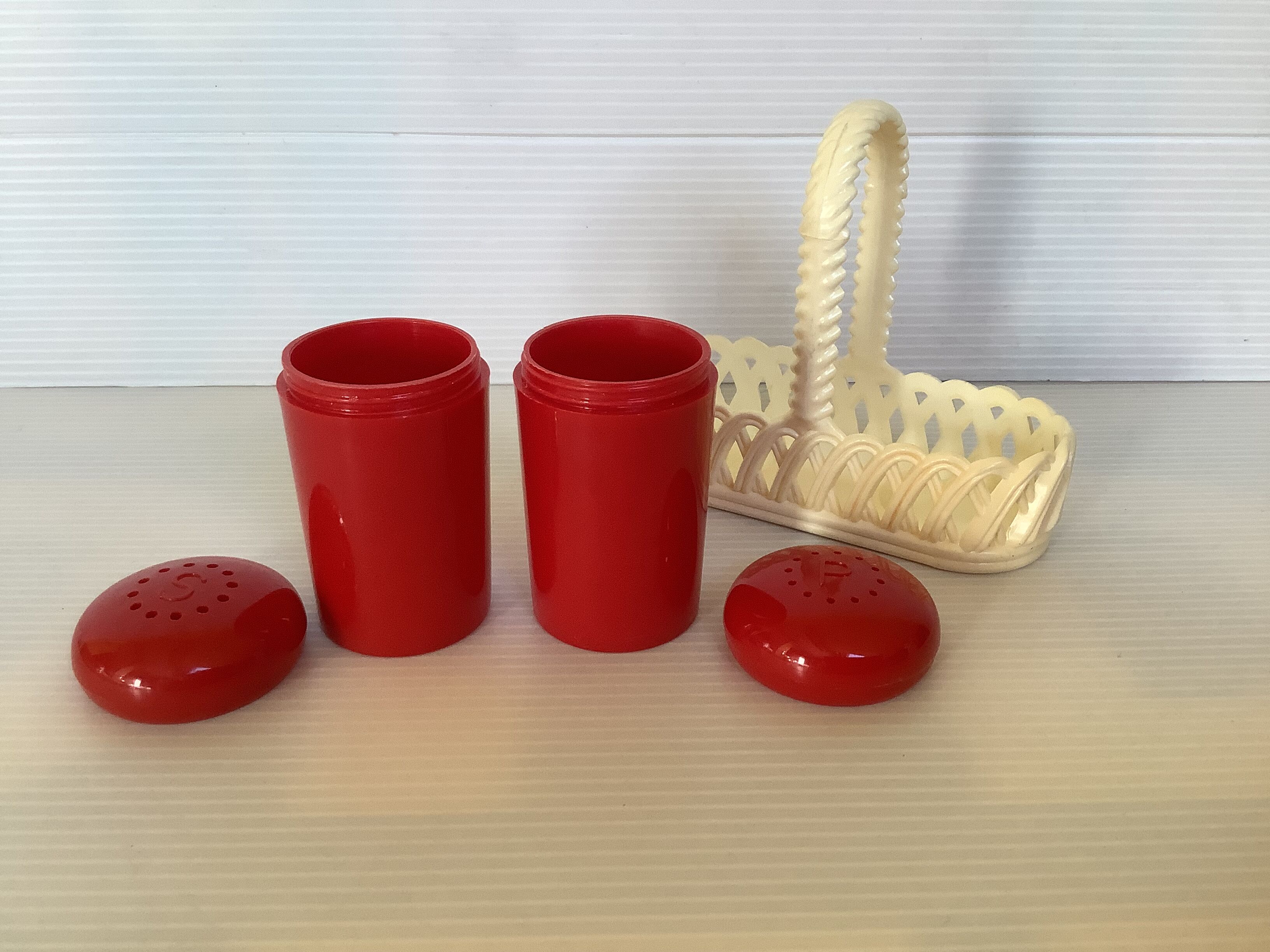 Red and white plastic salt and pepper shakers Emsa.