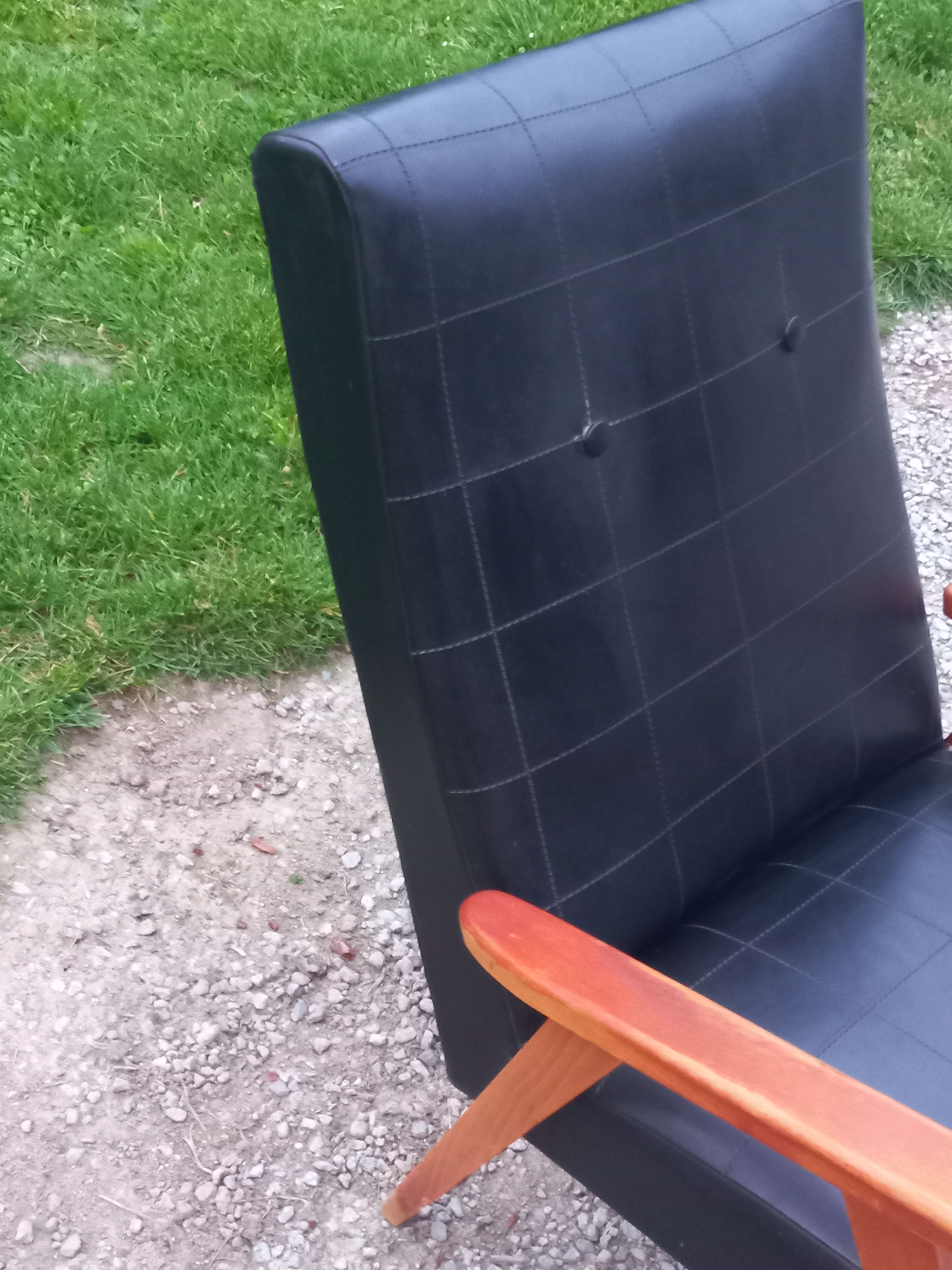 Pair of vintage beech armchairs feet compass covered with black moleskine from the 50s