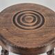 Tabouret brutaliste tripode en bois massif tourné