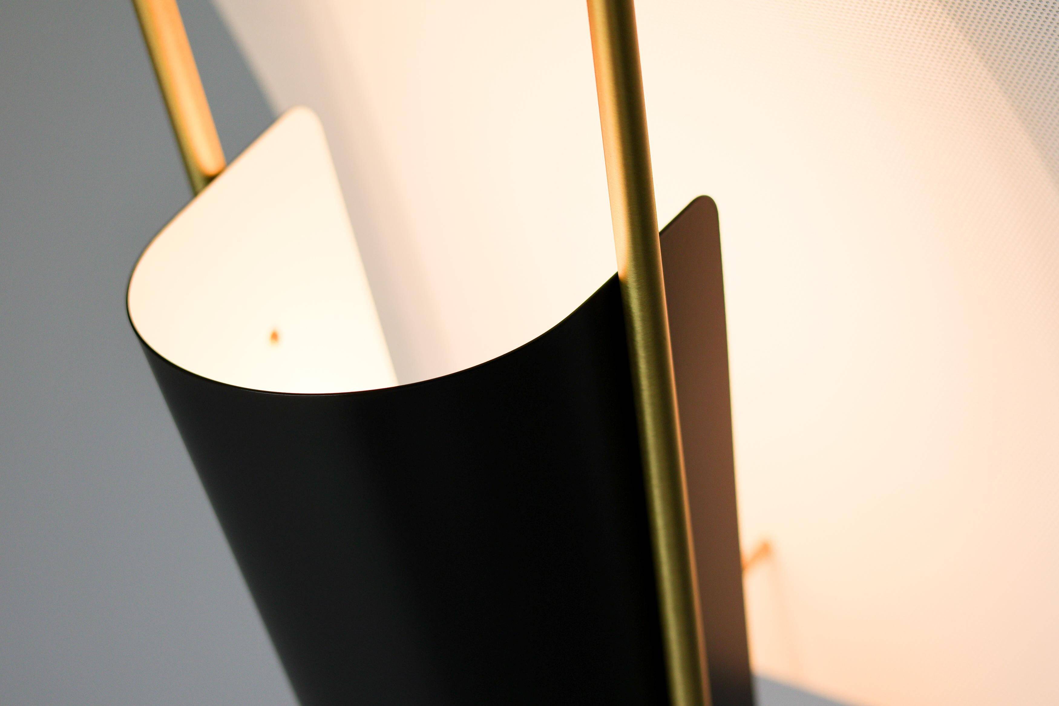 Kite floor lamp by Pierre Guariche, brass and steel, mid-20th century.