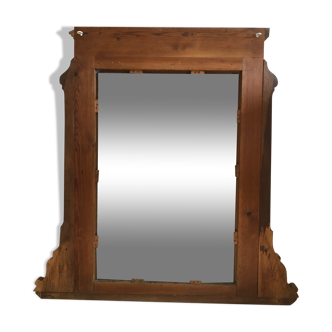 Antique wooden mirror in trumeau style