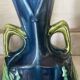 Pair of vases in slipware with Art Nouveau floral decoration.