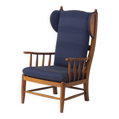 Fauteuil lounge français en chêne et tissu bleu, années 1960.