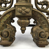 Lot of a pair of chenets and front of gilded bronze fireplace, nineteenth