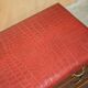 Crocodile leather and hardwood luggage rack in Mid-Century Modern style