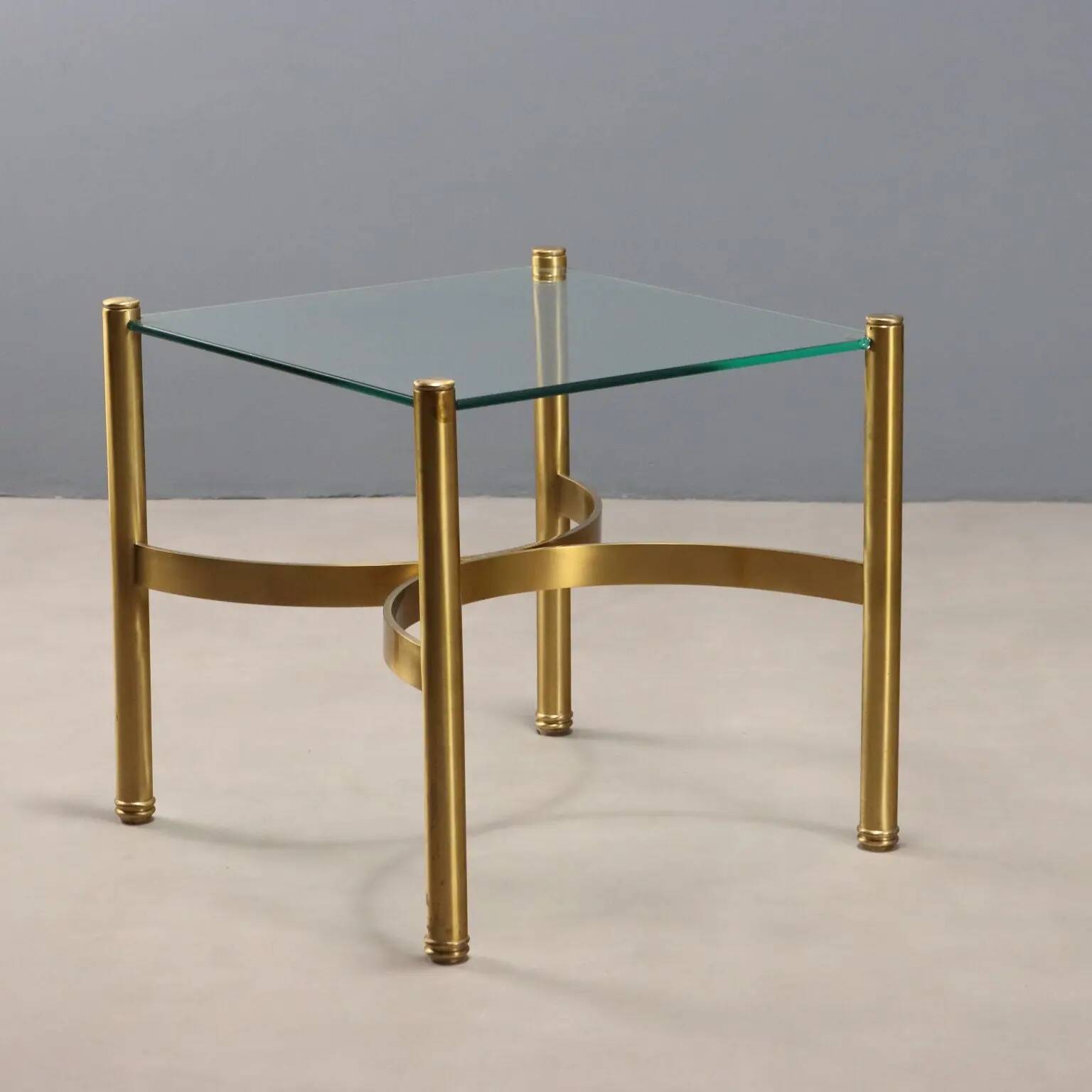 Vintage brass coffee table with glass top, Italian design from the 1970s.