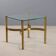 Vintage brass coffee table with glass top, Italian design from the 1970s.