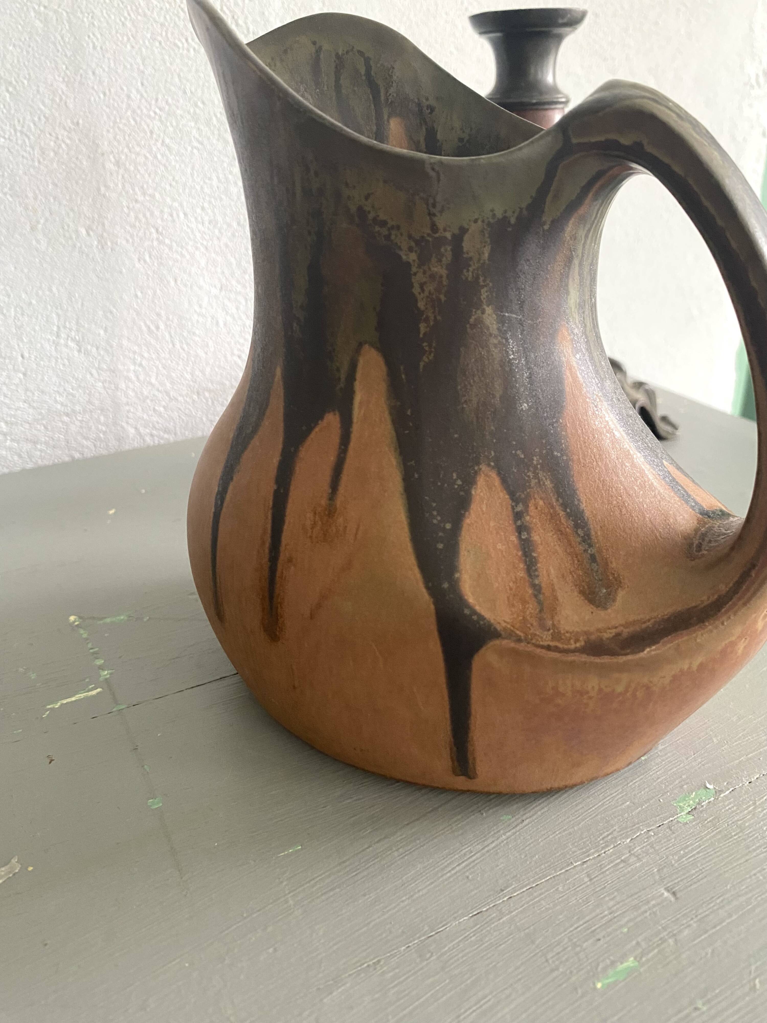 Denbac pitcher, flamed terracotta, 1900