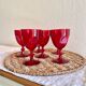 Footed glasses in ruby red crystal