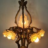 LOUIS XV style chandelier in gilded and patinated bronze with draped women