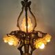 LOUIS XV style chandelier in gilded and patinated bronze with draped women