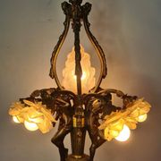 LOUIS XV style chandelier in gilded and patinated bronze with draped women