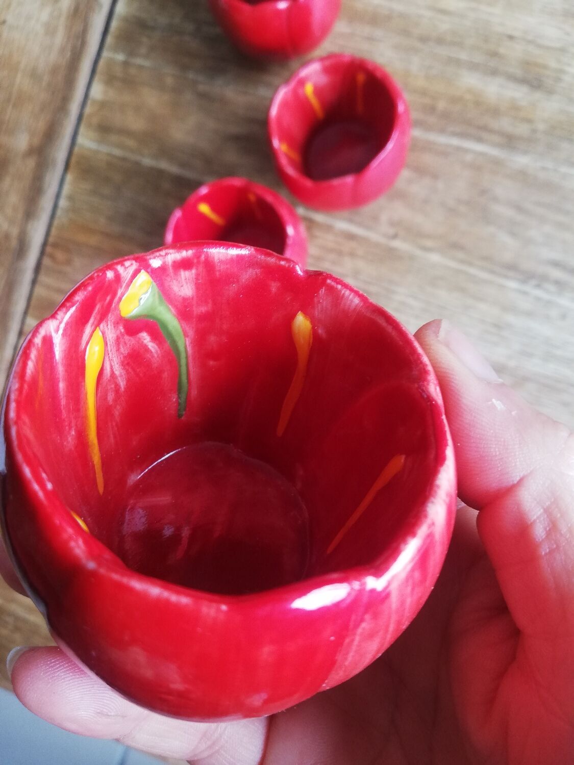 Set of 4 red tulip bowls by Villeroy & Boch.