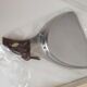 Picks up new vintage shovel and sweeper crumbs