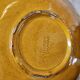 Glazed ceramic bowl amber — Atelier Cérenne, Vallauris (1950s)