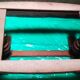 Large cream marble coffee table with solid cherry wood base