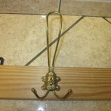 old coat rack with 5 metal hooks