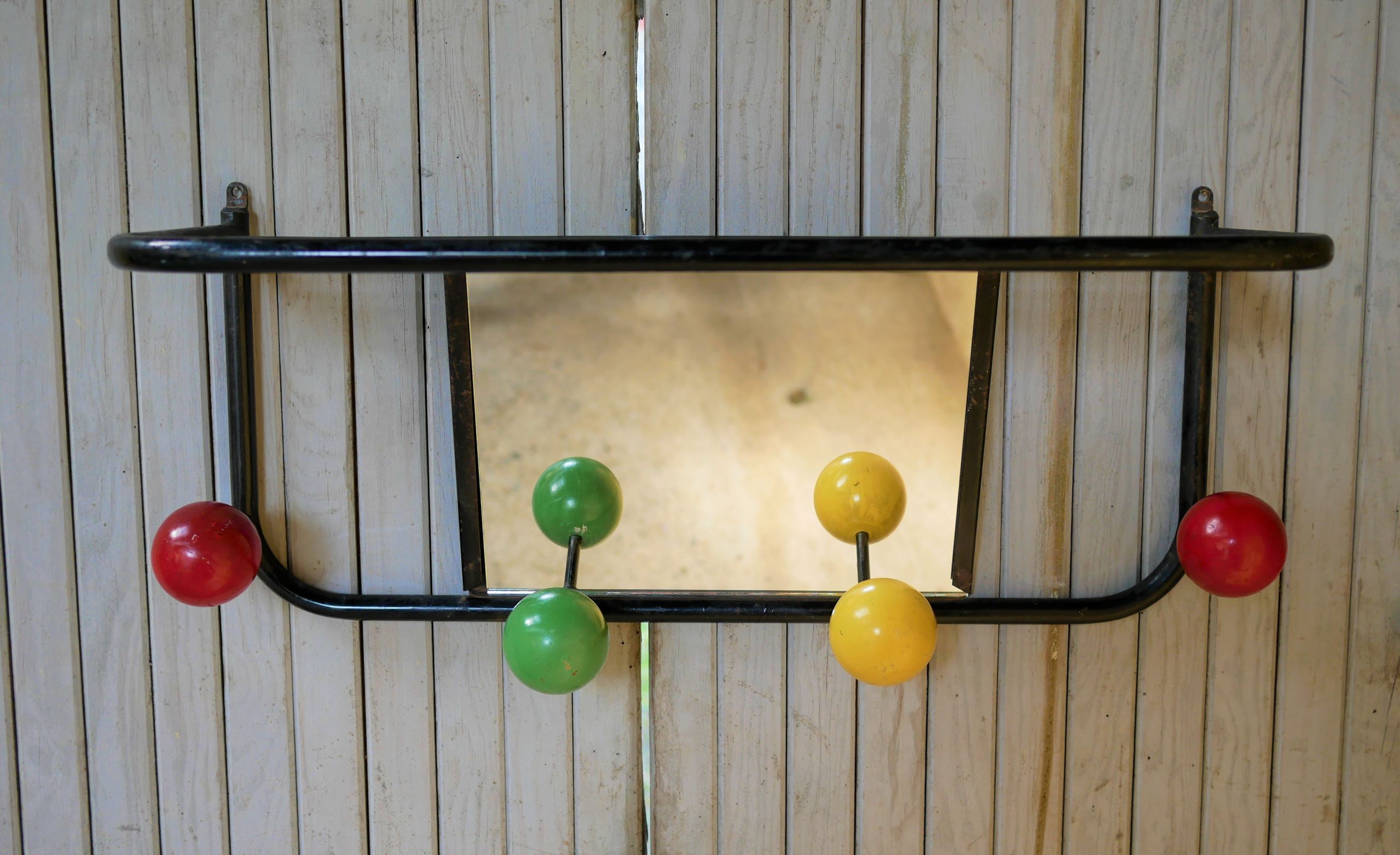 Vintage wall coat holder with 4 coloured balls, mirror and shelf