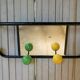 Vintage wall coat holder with 4 coloured balls, mirror and shelf