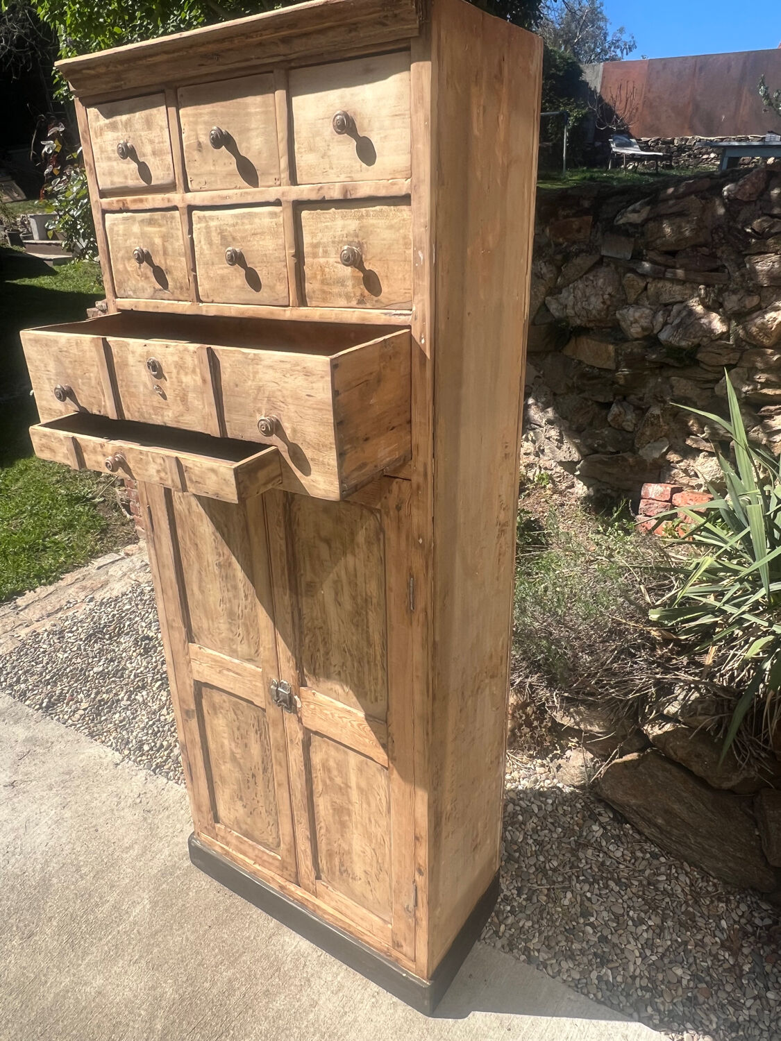 Beautiful piece of furniture with 8 drawers/2 doors in raw wood.
