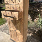 Beautiful piece of furniture with 8 drawers/2 doors in raw wood.