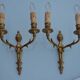 2 sculpted bronze wall lights