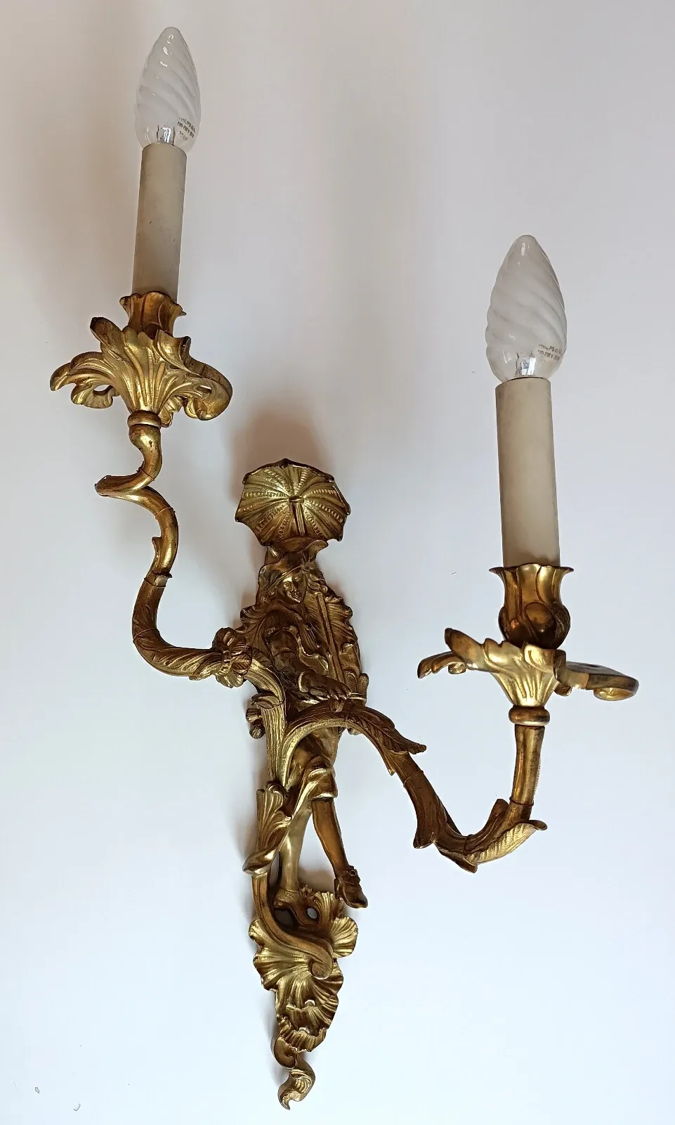 Pair of Régence style wall sconces in gilded bronze
