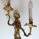 Pair of Régence style wall sconces in gilded bronze